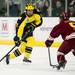 Michigan sophomore right wingman Zach Hyman tries to skate by Ferris State freshman defenseman Connor Schmidt on Friday, Mar. 1. Daniel Brenner I AnnArbor.com
